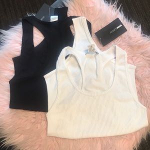 White Bodysuit, Black Bodysuit